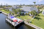 Flamingo House Backyard with Boat Lift and Deck